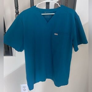 Figs scrub top. Size XL. Great condition. No tears or stains. Smoke free home.